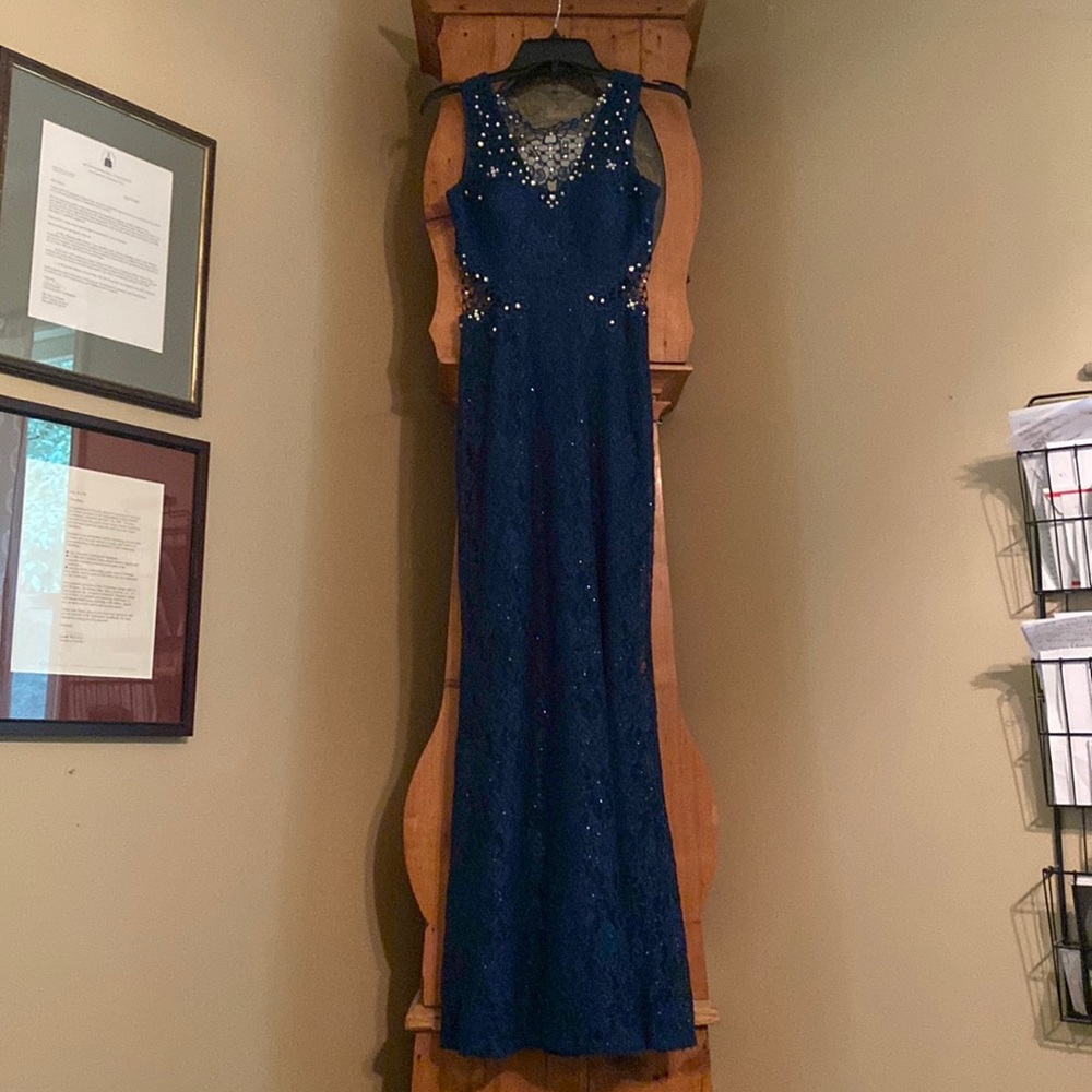 An aqua mermaid like dress.